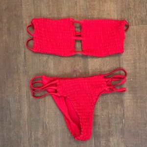 Red strapless smocked bandeau bikini